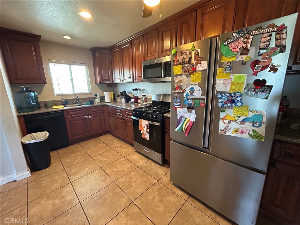 10351 Wells Avenue, Unit 1 Riverside, CA 92505 - Photo 9 of 37 Front Unit-Spacious Kitchen with Abundant Cabinetry & Appliances