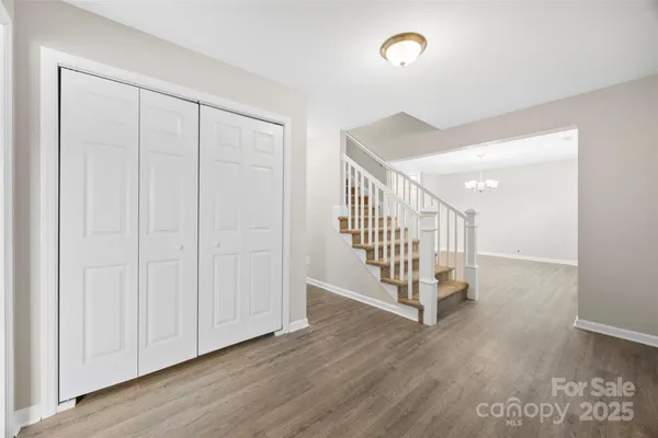 a view of a hallway with staircase