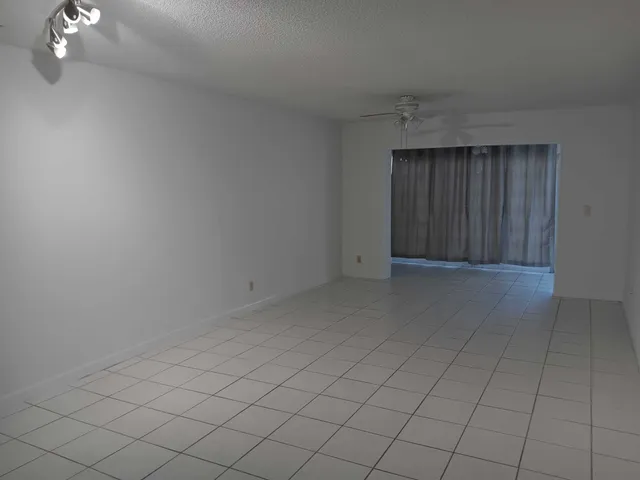 an empty room with mirror