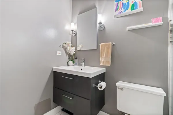 a bathroom with a shower and a toilet