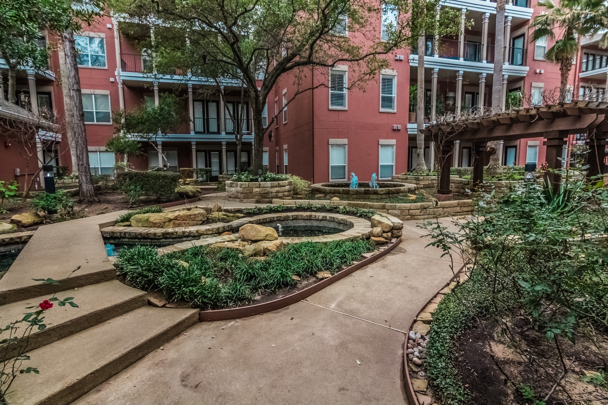 2400 McCue Road, Unit 202 Houston, TX 77056 - Photo 20 of 24 front view of a house with a yard