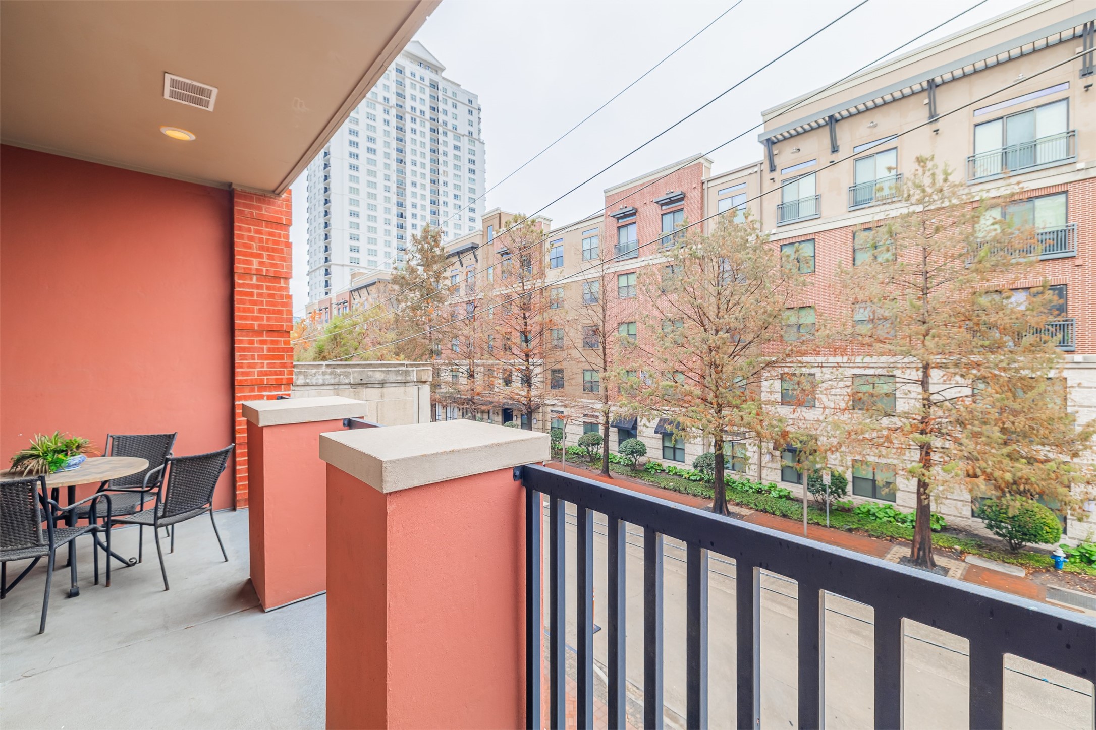 2400 McCue Road, Unit 202 Houston, TX 77056 - Photo 10 of 24 a view of a city from a balcony