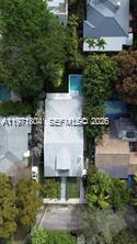 640 Northeast 71st Street Miami, FL 33138 - Photo 13 of 14 an aerial view of residential houses with outdoor space