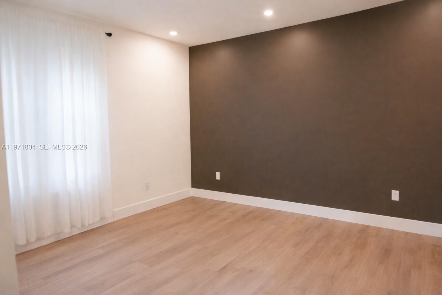 640 Northeast 71st Street Miami, FL 33138 - Photo 7 of 14 a view of an empty room