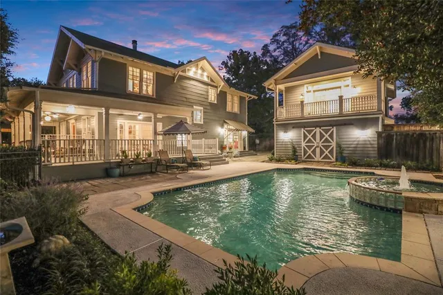 a view of a house with swimming pool