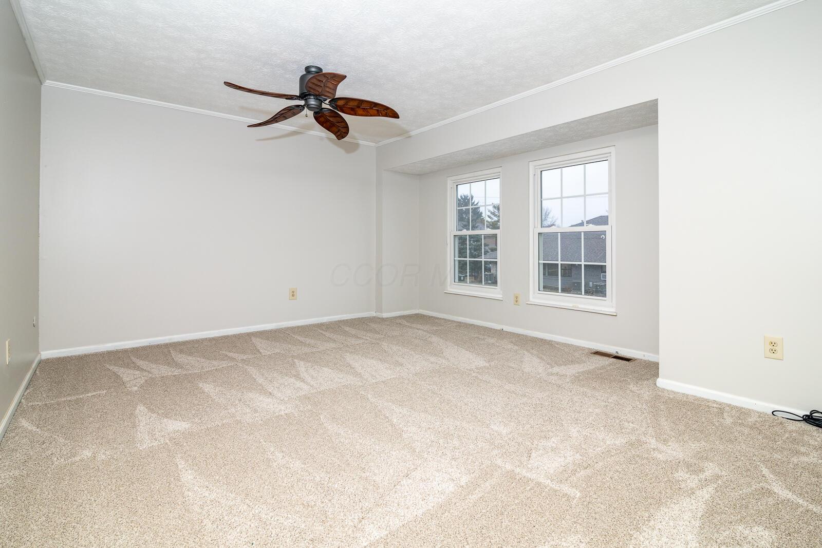 5179 Rittenhouse Square North, Unit 2379 Columbus, OH 43220 - Photo 19 of 32 Spacious Owner's Suite with Center Ceiling Fan, Fresh Paint & New Plush Carpeting.