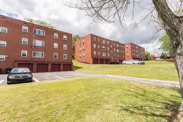 a car parked in front of a building