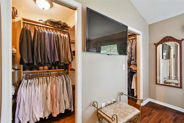 an aerial view of a house with outdoor space and lake view