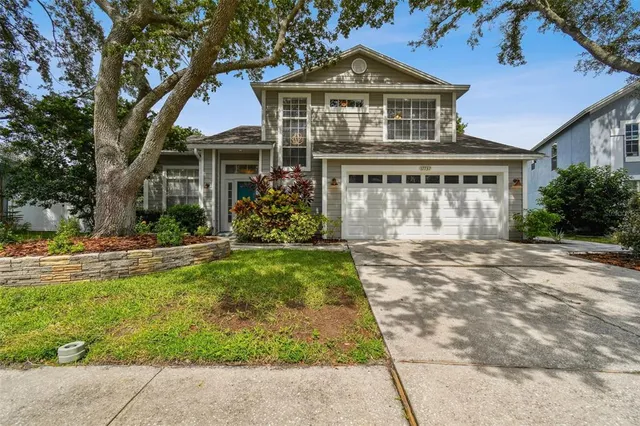 a view of a workspace with furniture and chandelier