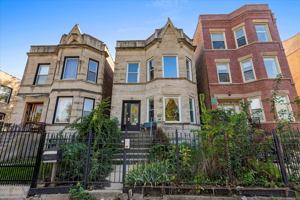 3145 West Augusta Boulevard, Unit 2 Chicago, IL 60622 - Photo 1 of 29 a front view of a multi story building