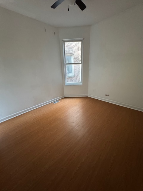 3145 West Augusta Boulevard, Unit 2 Chicago, IL 60622 - Photo 15 of 29 an empty room with a window