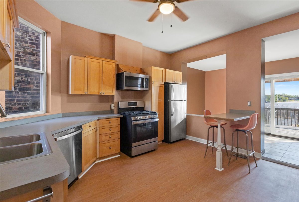 3145 West Augusta Boulevard, Unit 2 Chicago, IL 60622 - Photo 21 of 29 a kitchen with a sink appliances and furniture