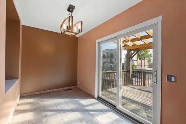a view of a balcony with wooden floor