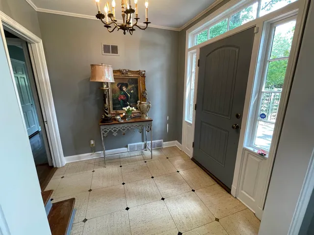 a view of a bathroom with a sink and mirror