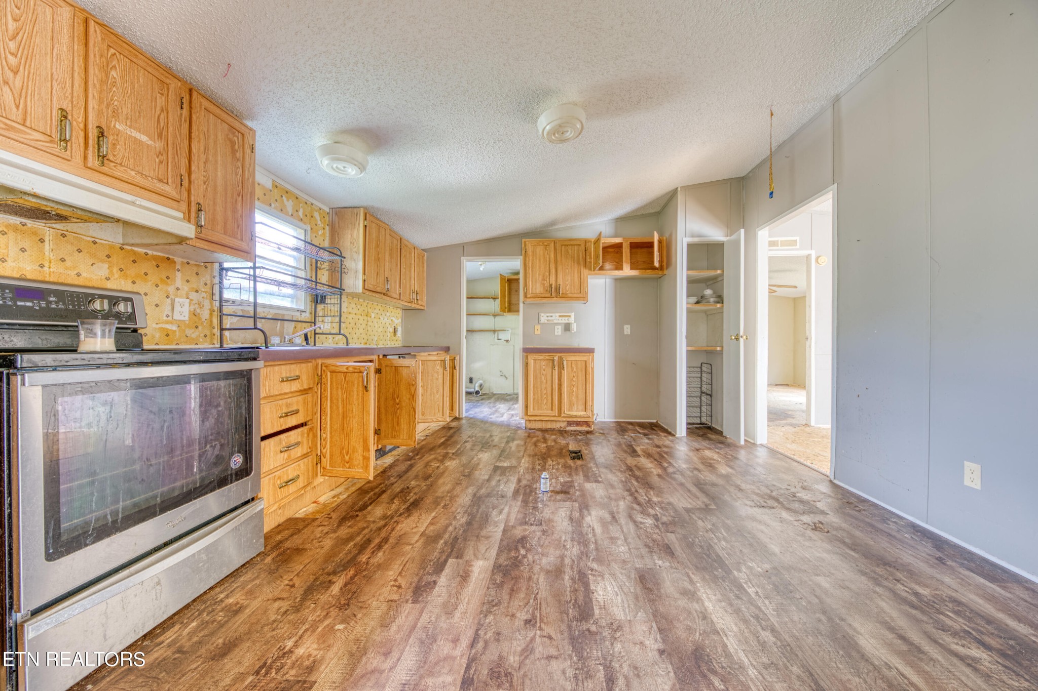 8504 Childress Road Powell, TN 37849 - Photo 8 of 15 a view of a kitchen with a sink and cabinets