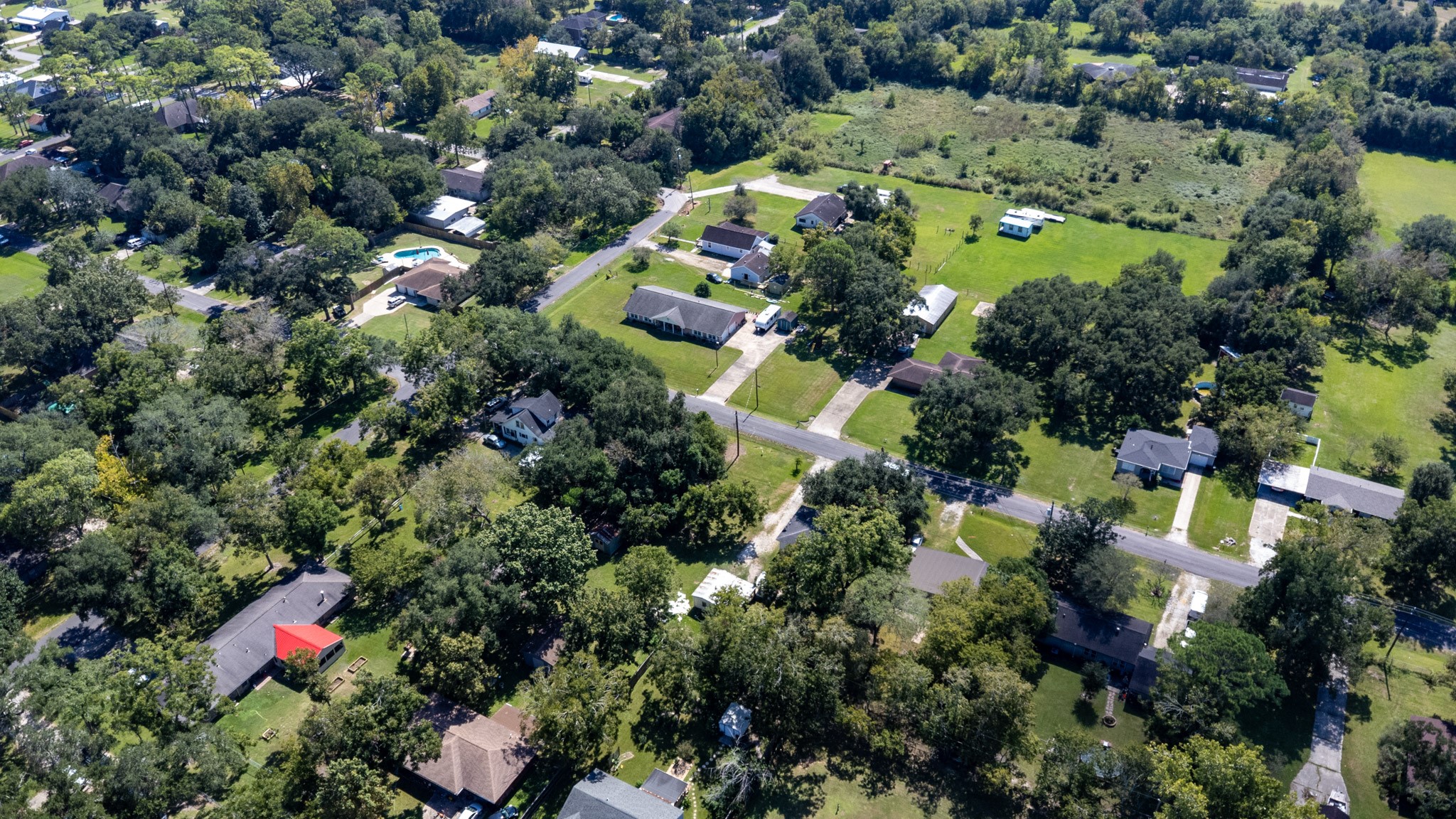 24-th 24th Street Santa Fe, TX 77510 - Photo 12 of 18 an aerial view of residential house with outdoor space and swimming pool