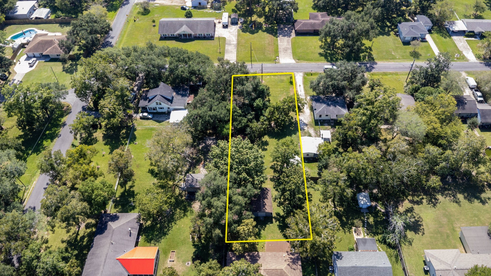24-th 24th Street Santa Fe, TX 77510 - Photo 13 of 18 an aerial view of a house with a yard and garden