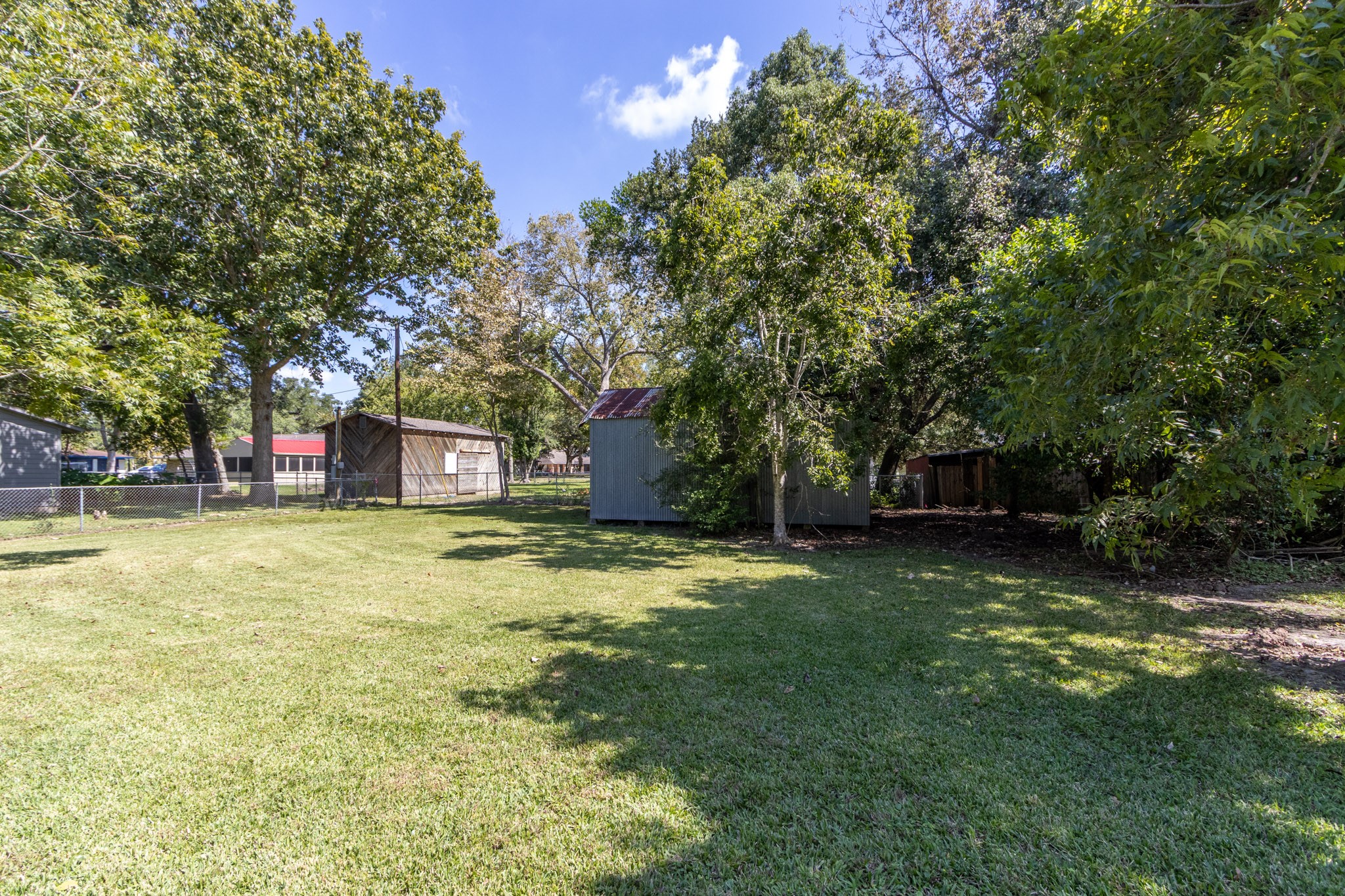 24-th 24th Street Santa Fe, TX 77510 - Photo 2 of 18 a fire hydrant in the middle of a field