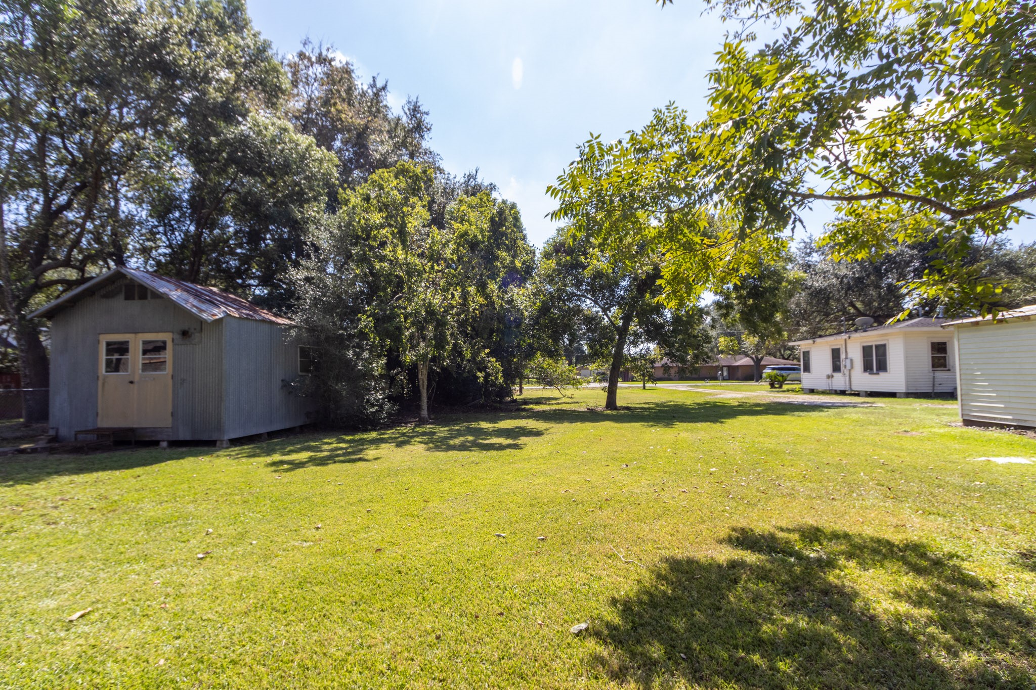 24-th 24th Street Santa Fe, TX 77510 - Photo 4 of 18 a house with swimming pool in front of it