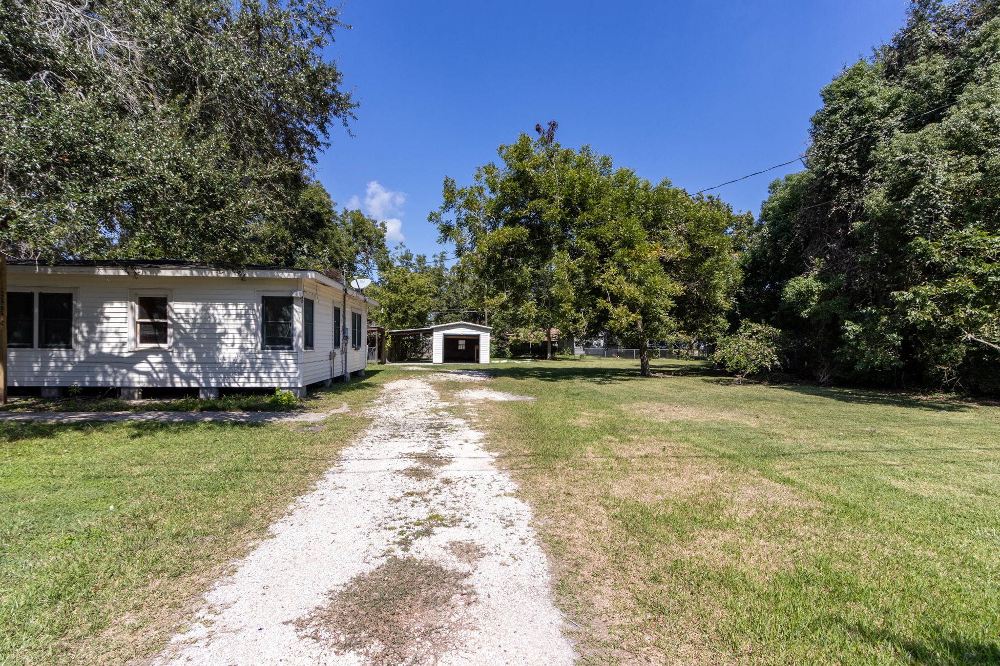 24-th 24th Street Santa Fe, TX 77510 - Photo 7 of 18 a view of a swimming pool with a patio