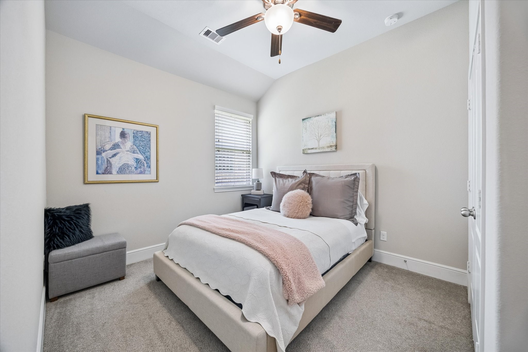 19 Peace Tree Way Tomball, TX 77375 - Photo 11 of 36 Secondary bedroom featuring trendy paint colors and elegant crown molding.