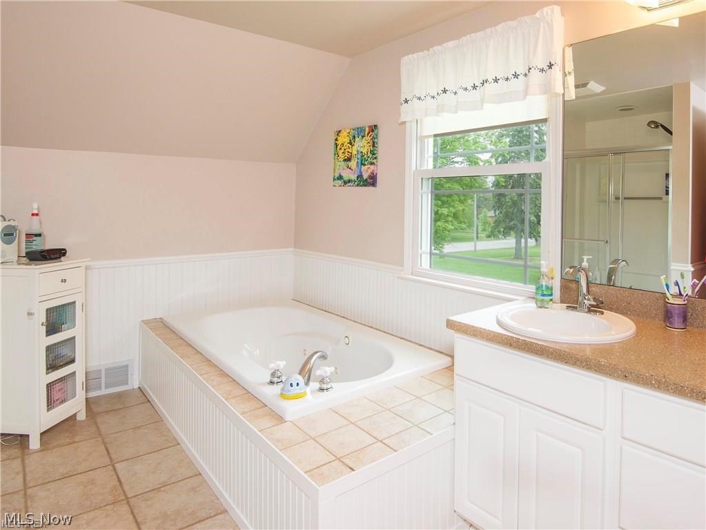 5360 Brainard Road Solon, OH 44139 - Photo 11 of 21 Spacious second floor bathroom with jetted tub, walk-in shower and double sinks.