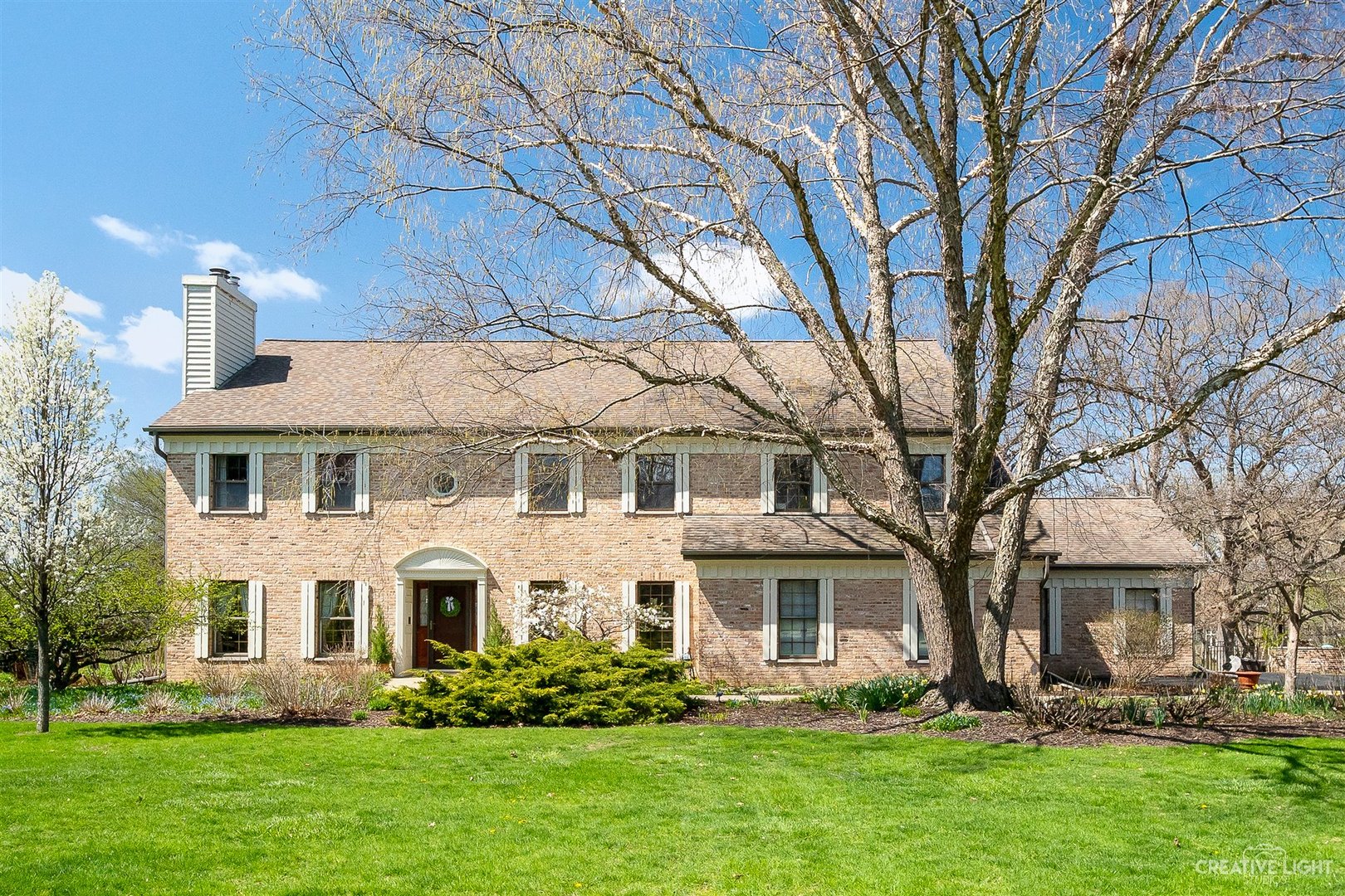 5S430 Deer Ridge Path Big Rock, IL 60511 - Photo 1 of 72 a front view of a house with a garden and trees