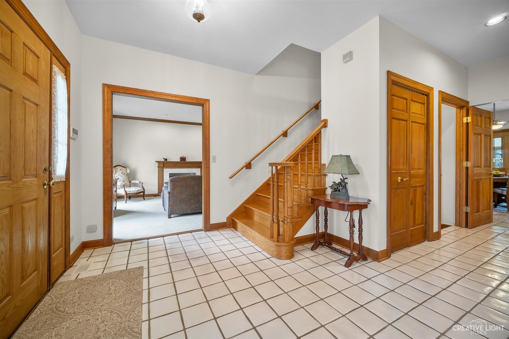 5S430 Deer Ridge Path Big Rock, IL 60511 - Photo 3 of 72 a view of a hallway with wooden floor and staircase