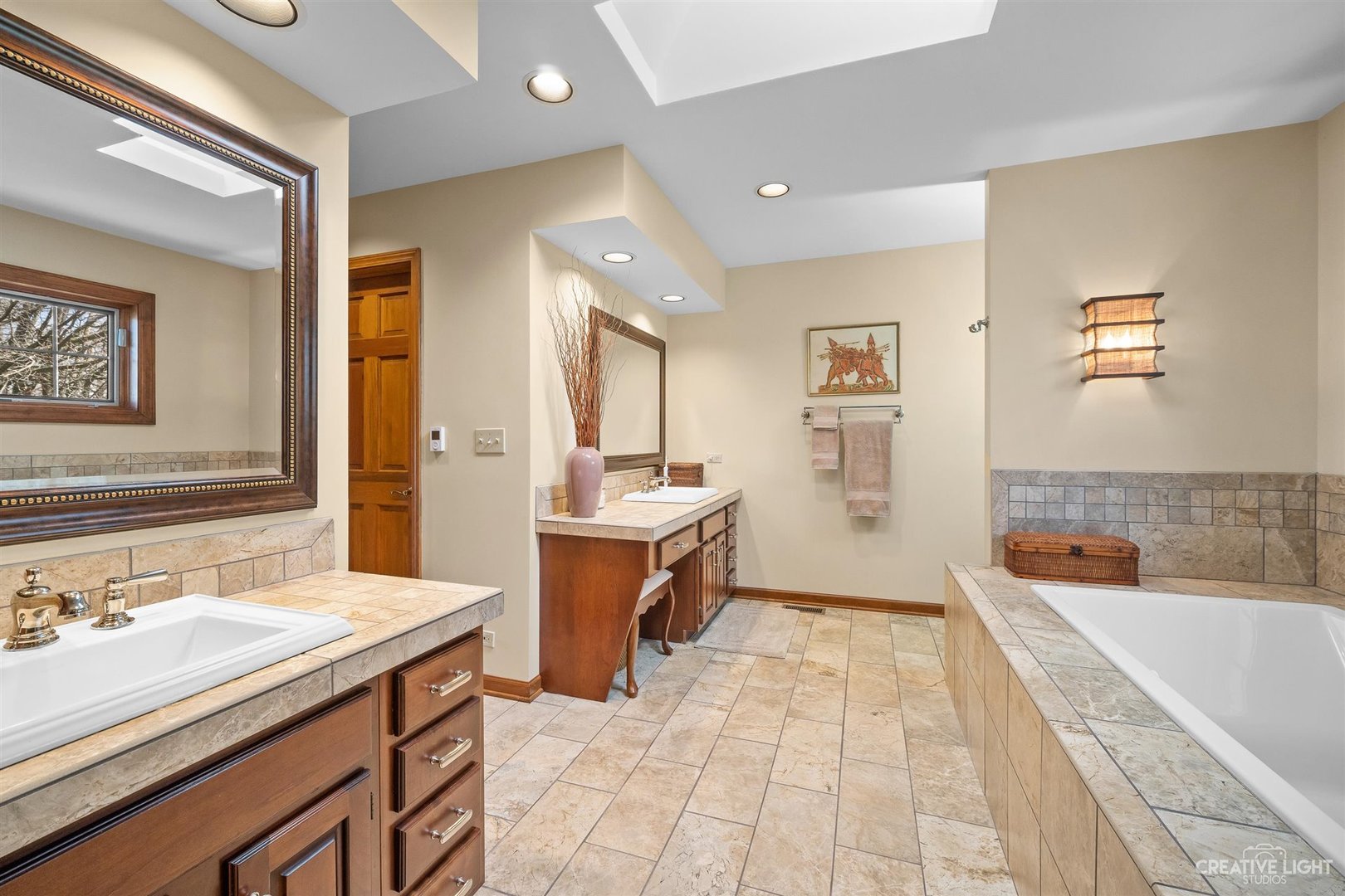 5S430 Deer Ridge Path Big Rock, IL 60511 - Photo 25 of 72 a spacious bathroom with a tub sink and mirror