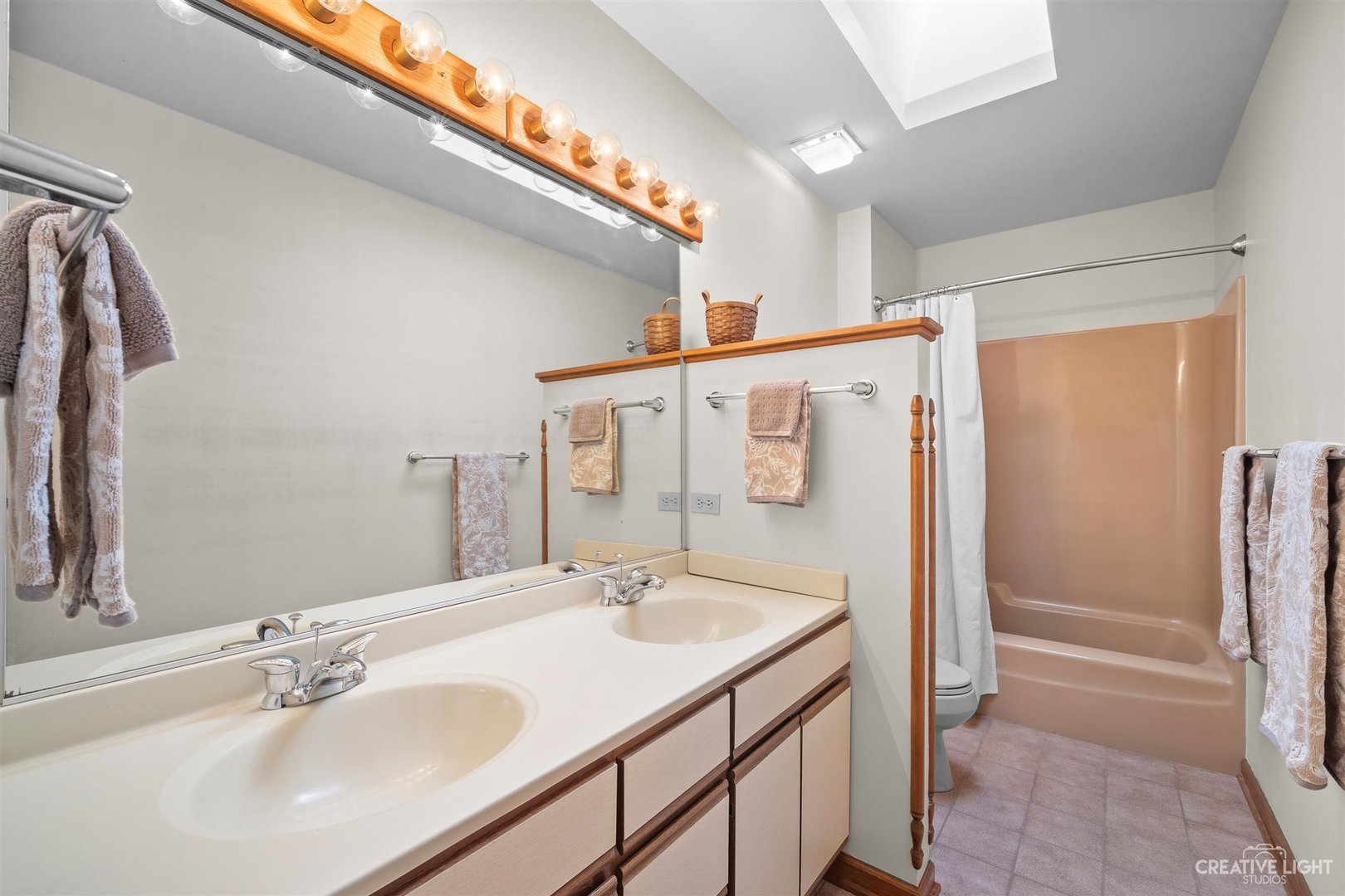 5S430 Deer Ridge Path Big Rock, IL 60511 - Photo 33 of 72 a bathroom with a sink a mirror and a shower