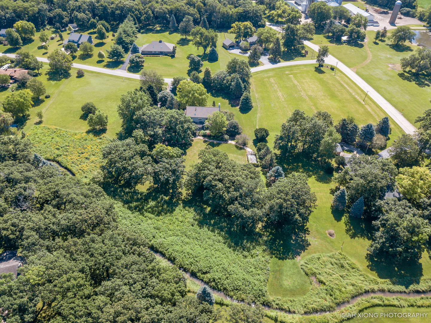 5S430 Deer Ridge Path Big Rock, IL 60511 - Photo 65 of 72 an aerial view of residential houses with outdoor space and swimming pool