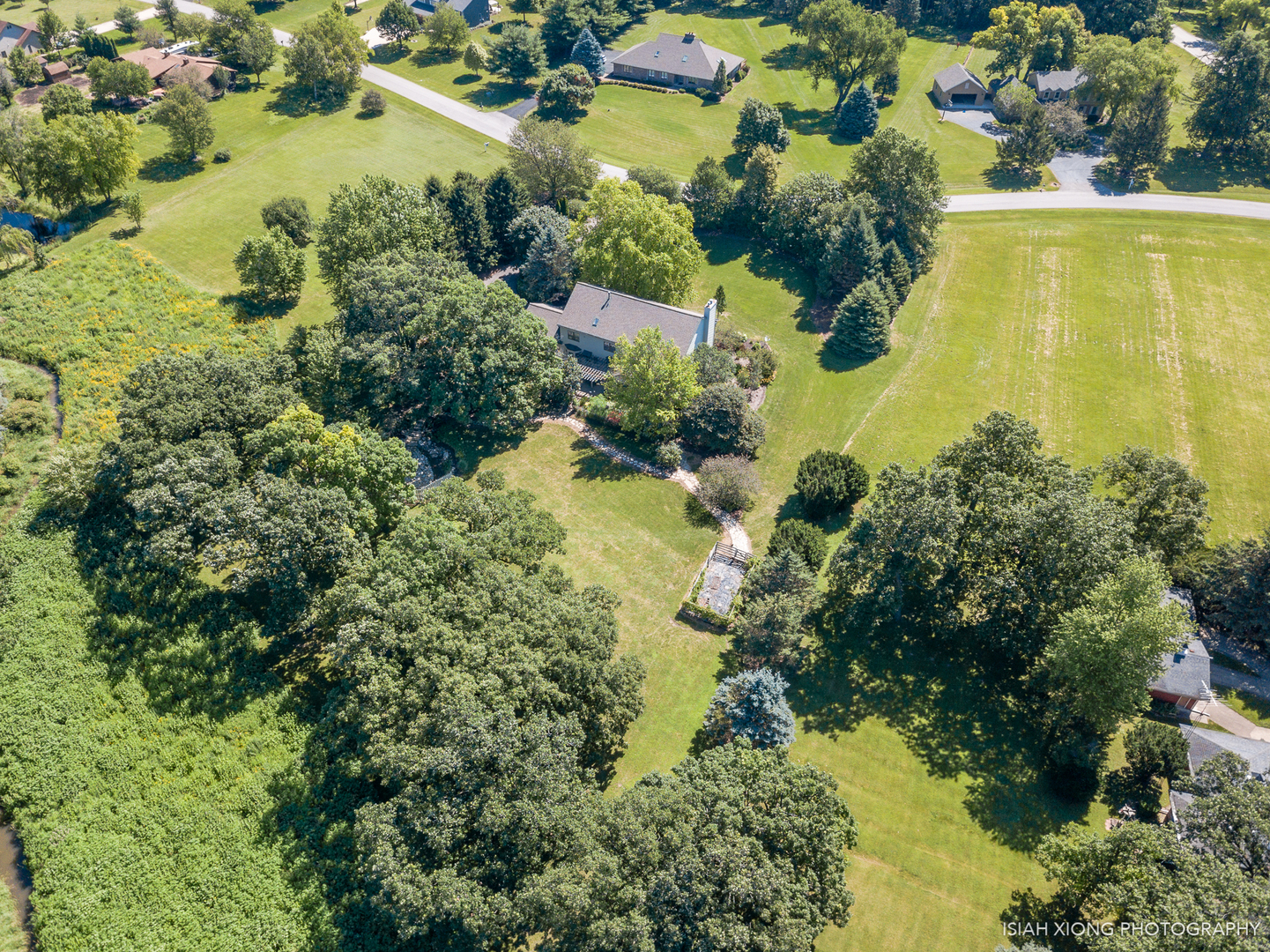 5S430 Deer Ridge Path Big Rock, IL 60511 - Photo 67 of 72 an aerial view of residential houses with outdoor space and trees all around