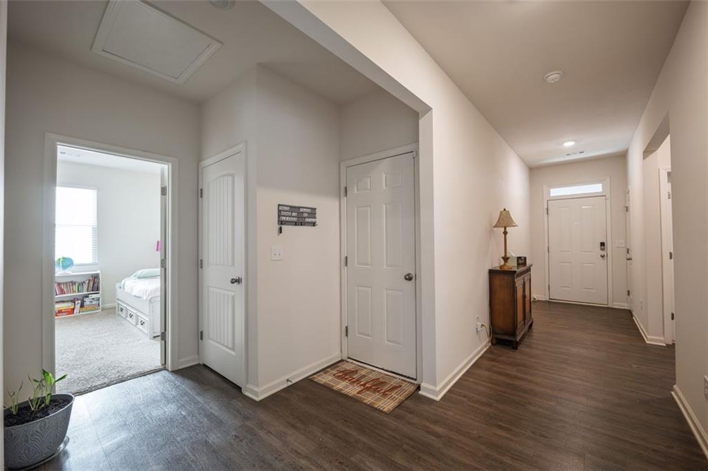 3841 Makeover Court Atlanta, GA 30349 - Photo 23 of 44 a view of hallway with wooden floor