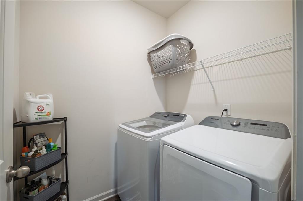 3841 Makeover Court Atlanta, GA 30349 - Photo 24 of 44 a utility room with dryer and washer