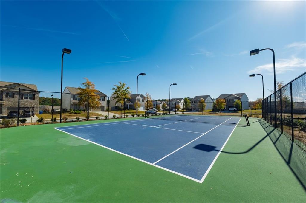 3841 Makeover Court Atlanta, GA 30349 - Photo 42 of 44 a view of a tennis court