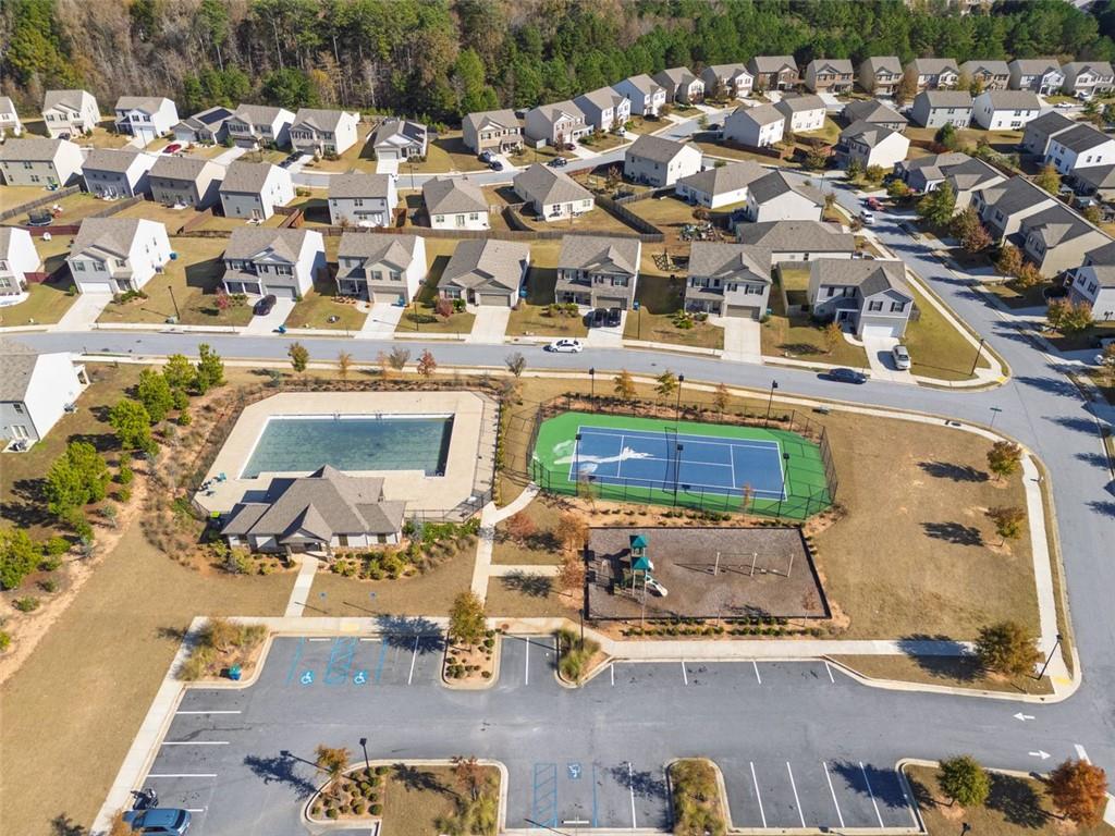 3841 Makeover Court Atlanta, GA 30349 - Photo 44 of 44 an aerial view of residential houses with outdoor space