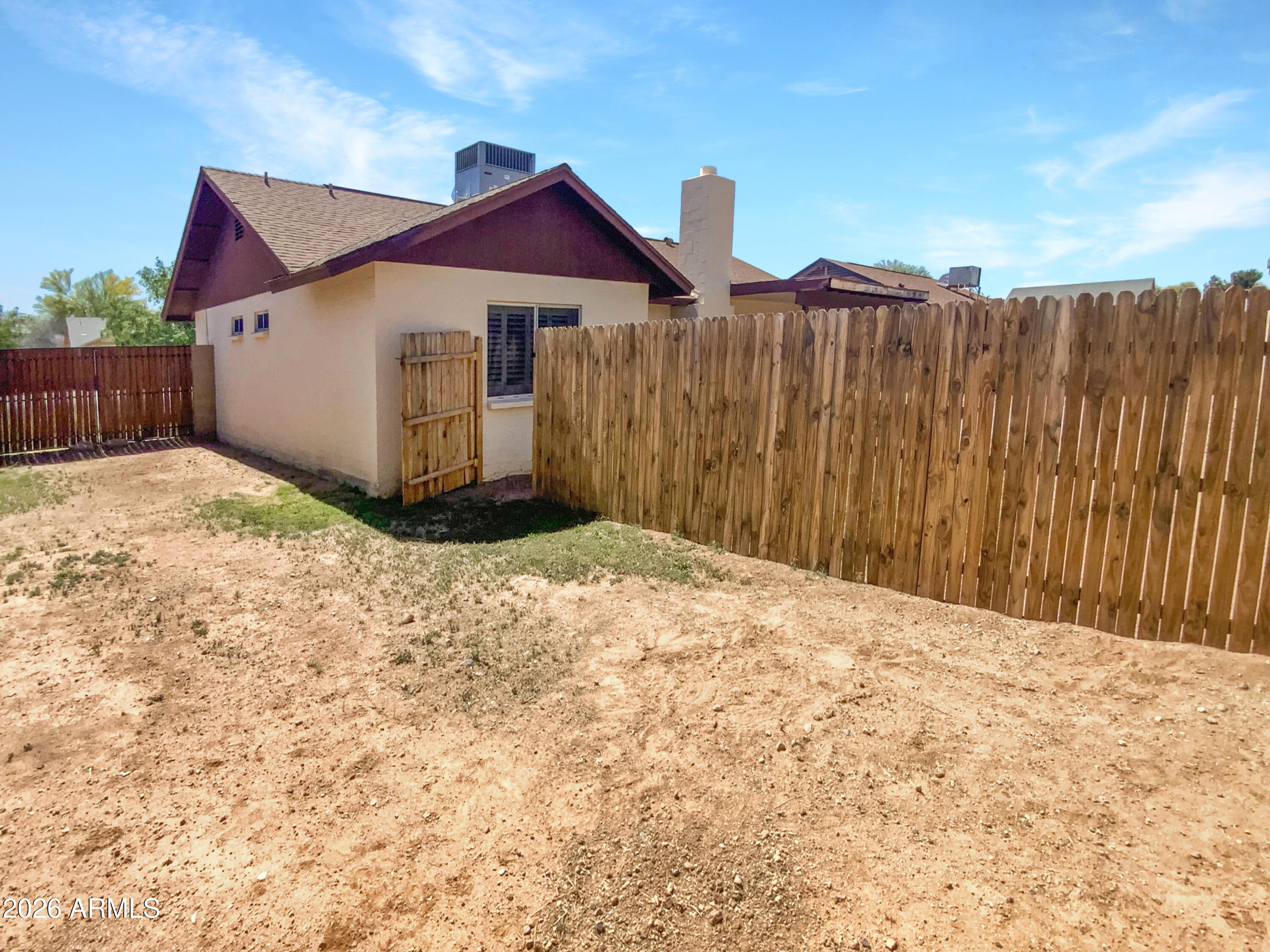 8508 West Ruth Avenue Peoria, AZ 85345 - Photo 16 of 17 a front view of a house with a yard