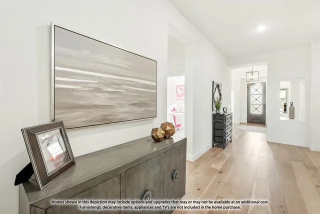 a view of entryway with wooden floor