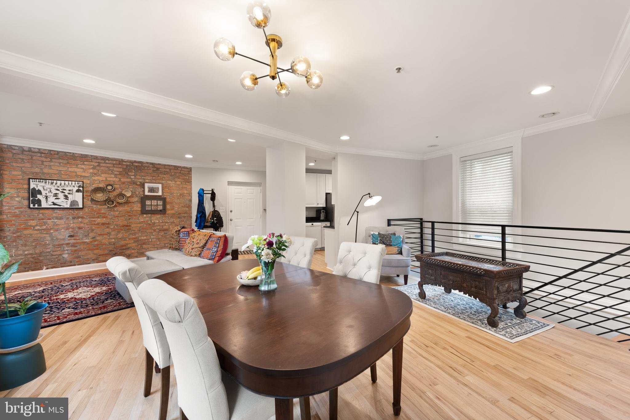 150 Rhode Island Avenue Northwest, Unit 103 Washington, DC 20001 - Photo 16 of 30 a view of a dining room with furniture