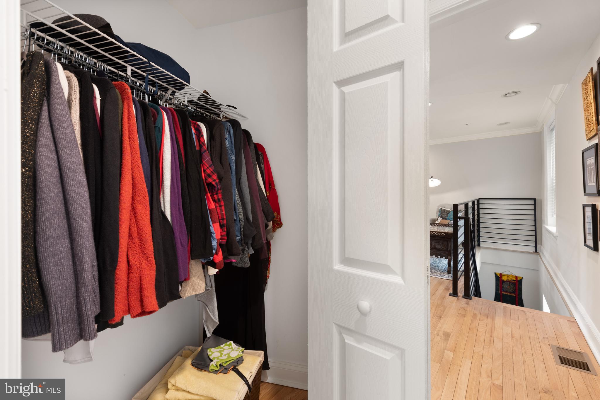 150 Rhode Island Avenue Northwest, Unit 103 Washington, DC 20001 - Photo 22 of 30 a view of walk in closet with clothes and shoes