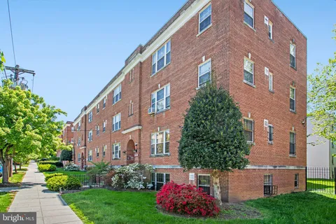 a building view with a garden space