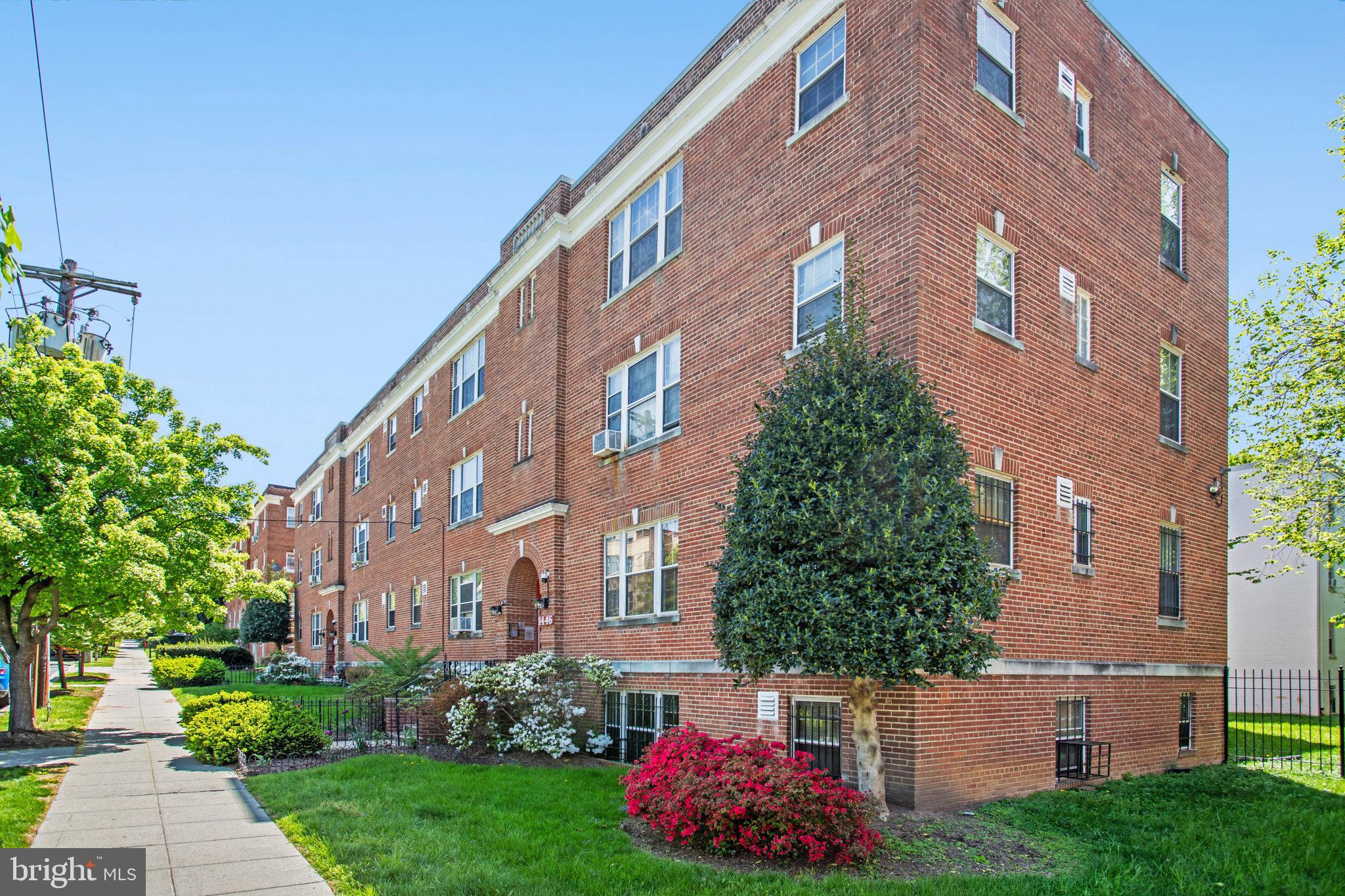 1446 Tuckerman Street Northwest, Unit 306 Washington, DC 20011 - Photo 25 of 26 a building view with a garden space