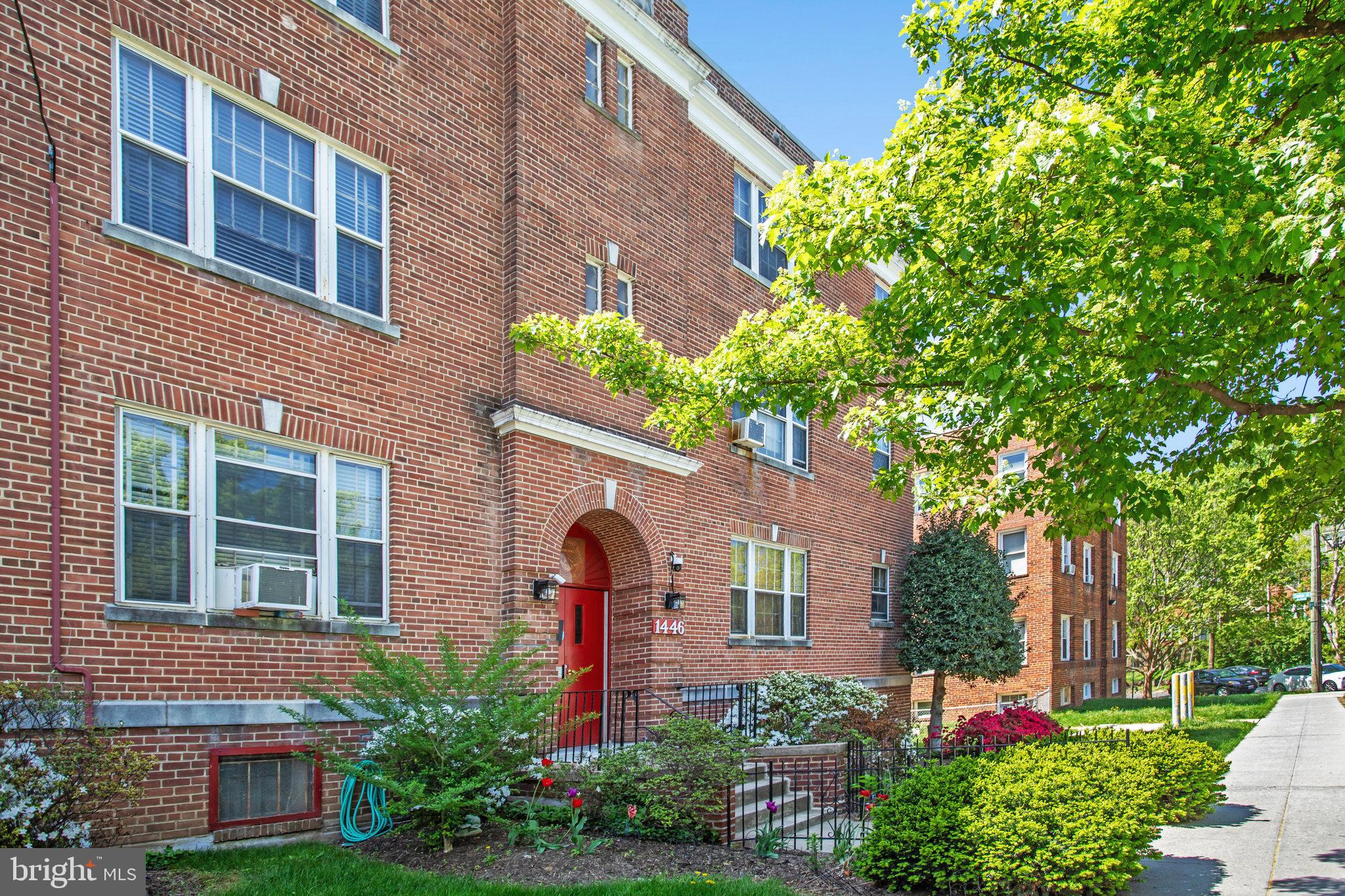 1446 Tuckerman Street Northwest, Unit 306 Washington, DC 20011 - Photo 26 of 26 a front view of a house with plants