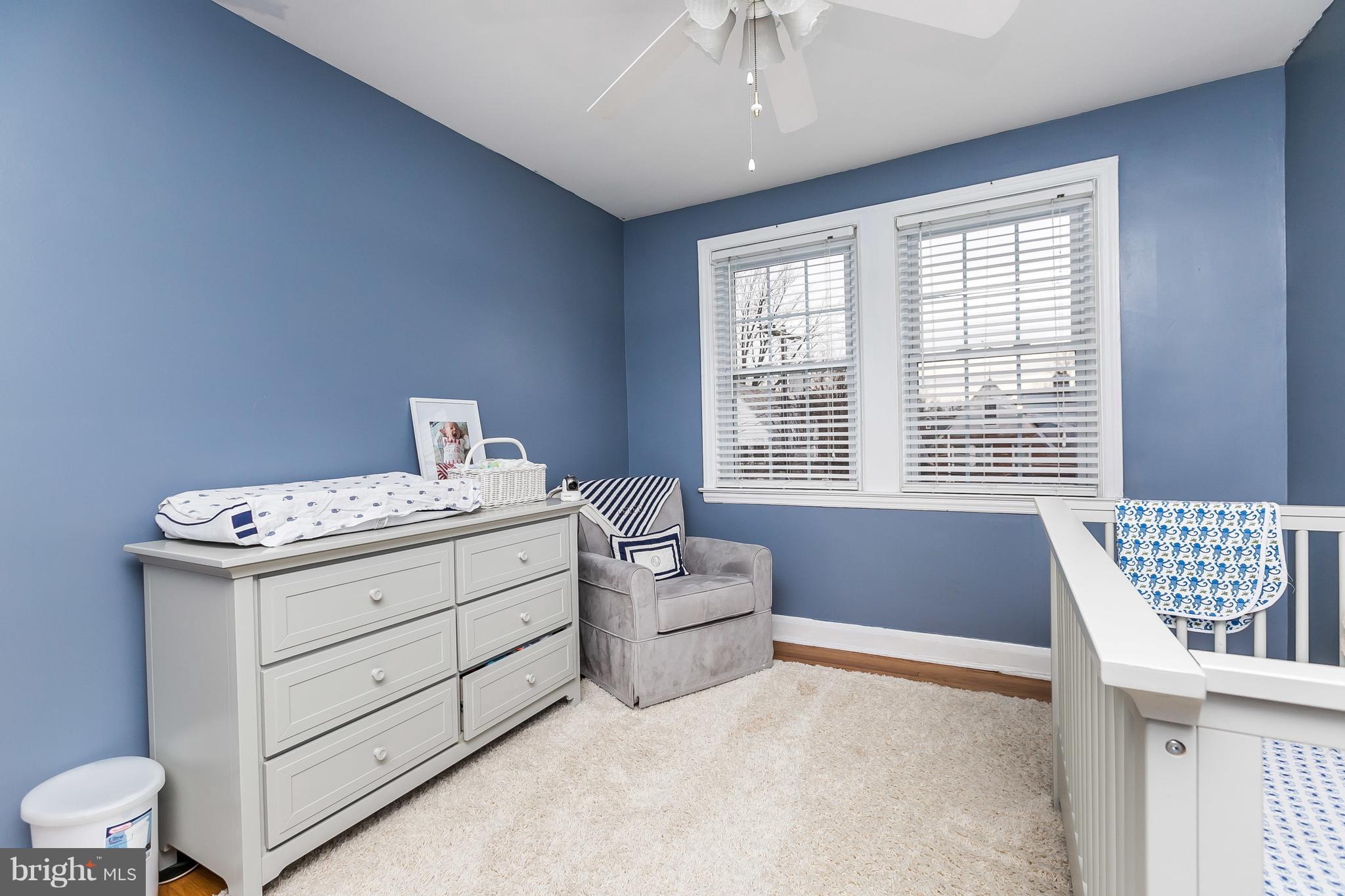326 Overbrook Road Baltimore, MD 21212 - Photo 13 of 35 a bedroom with a bed and a couch