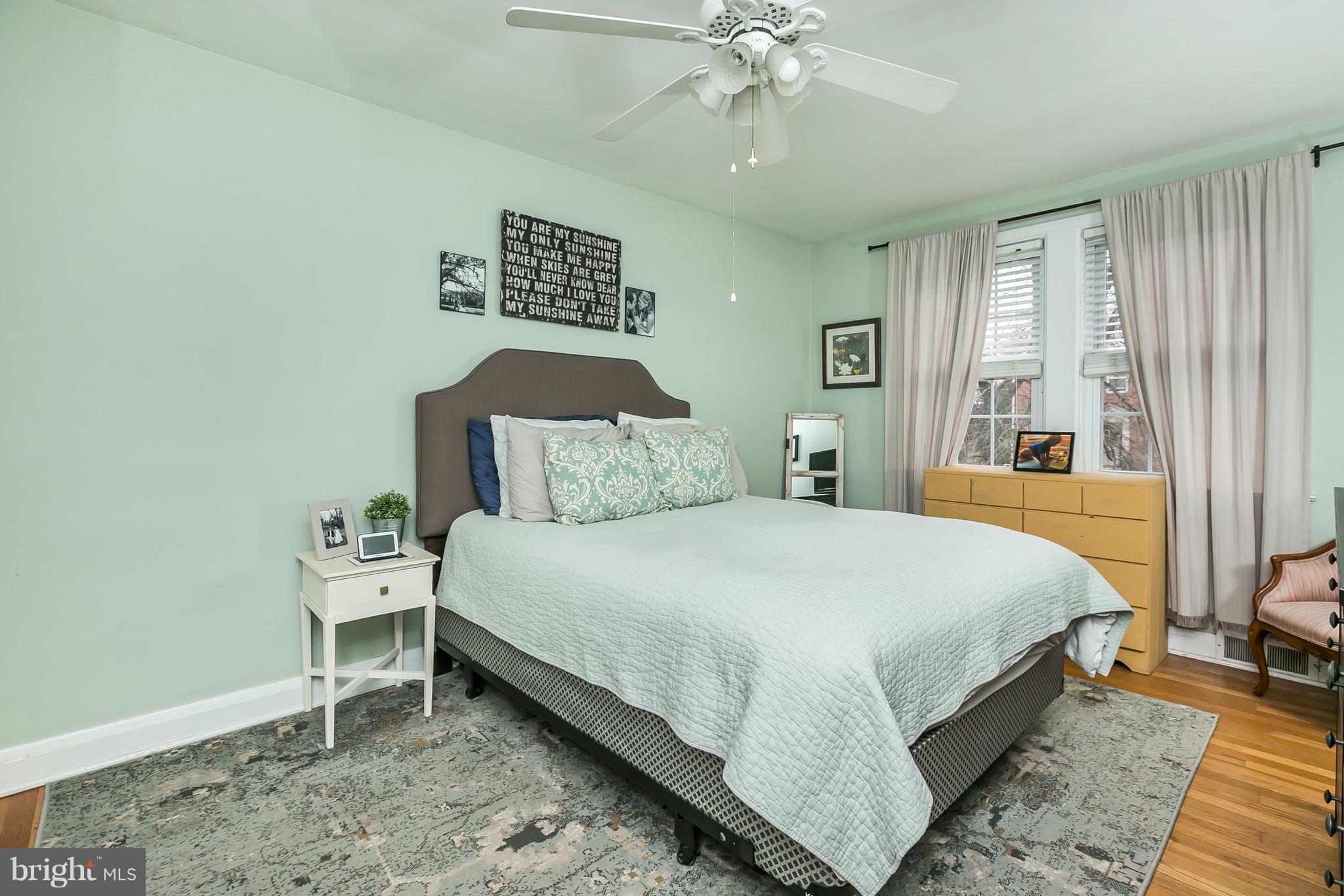 326 Overbrook Road Baltimore, MD 21212 - Photo 20 of 35 a bedroom with a bed and large mirror