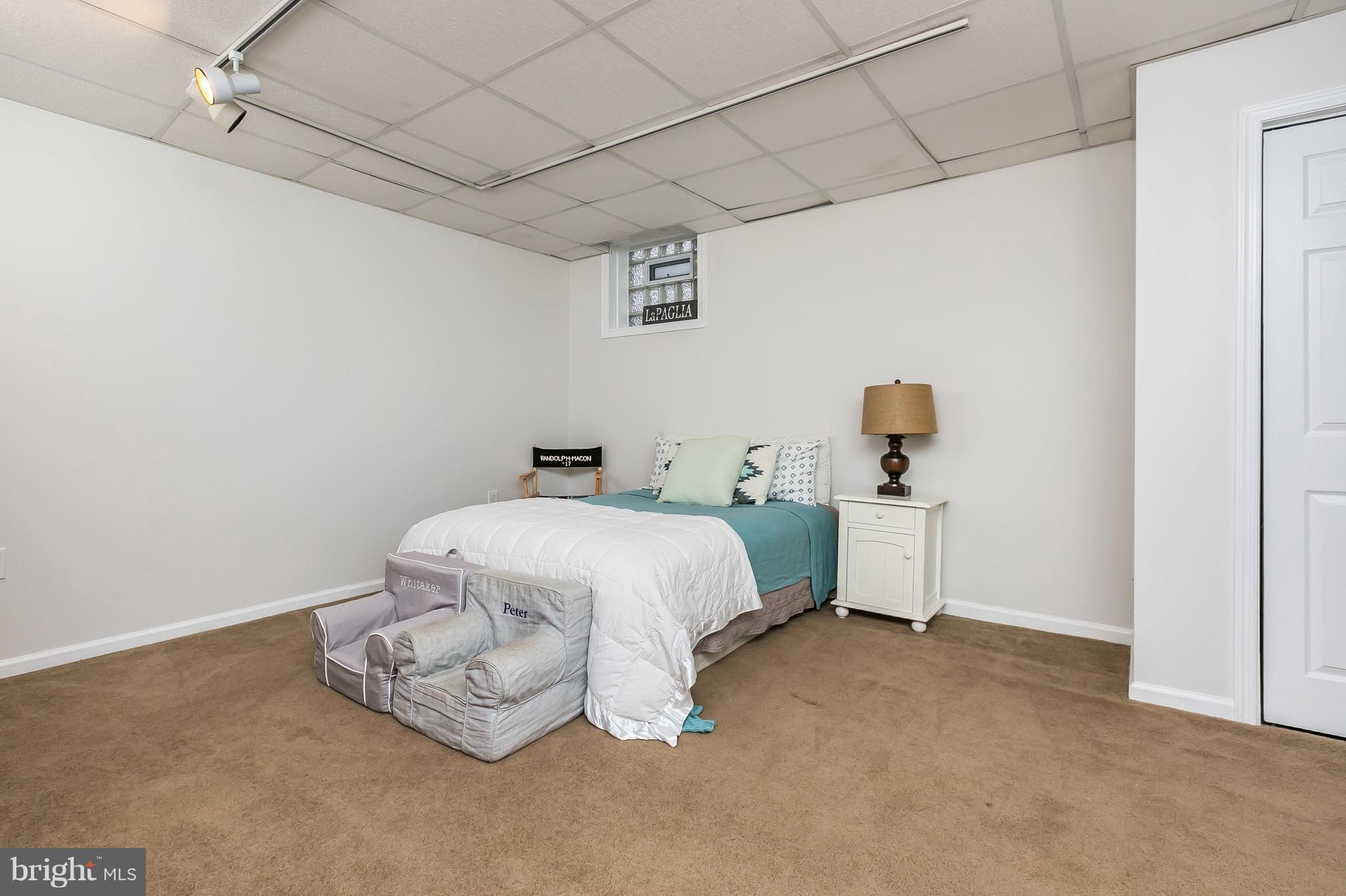 326 Overbrook Road Baltimore, MD 21212 - Photo 23 of 35 a bedroom with a bed and utility room