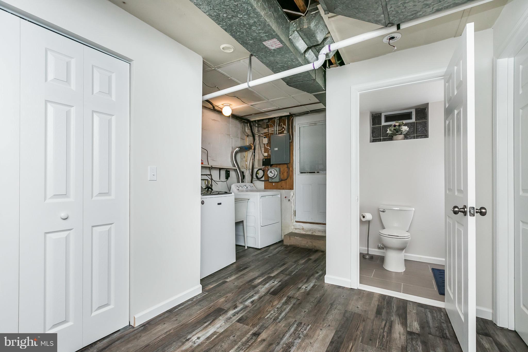 326 Overbrook Road Baltimore, MD 21212 - Photo 26 of 35 a bathroom with a sink and a toilet