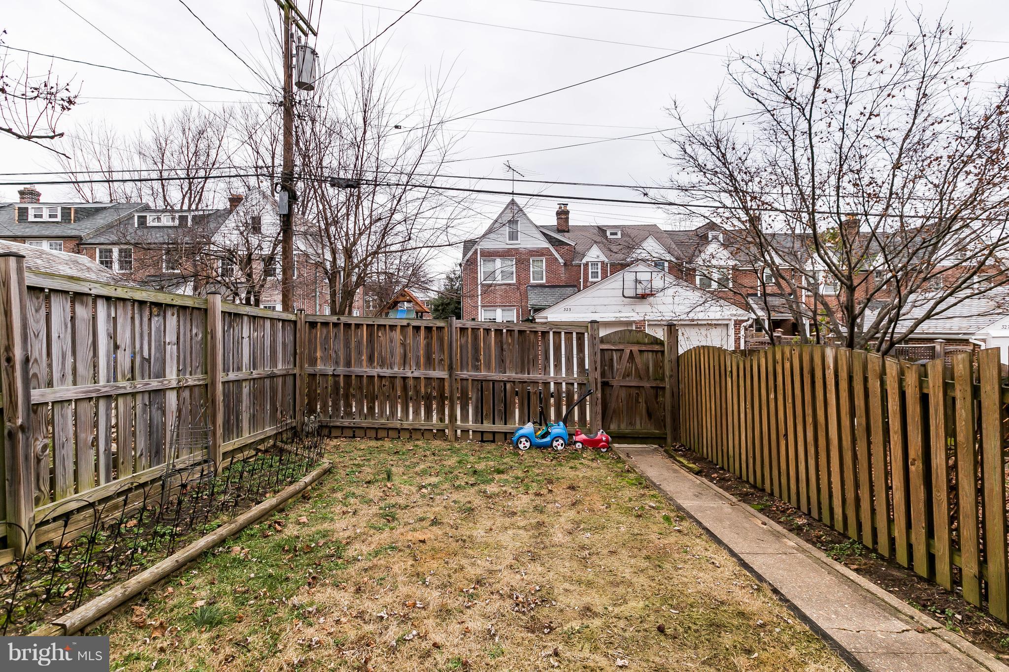 326 Overbrook Road Baltimore, MD 21212 - Photo 32 of 35 a view of a pathway of a wooden fence