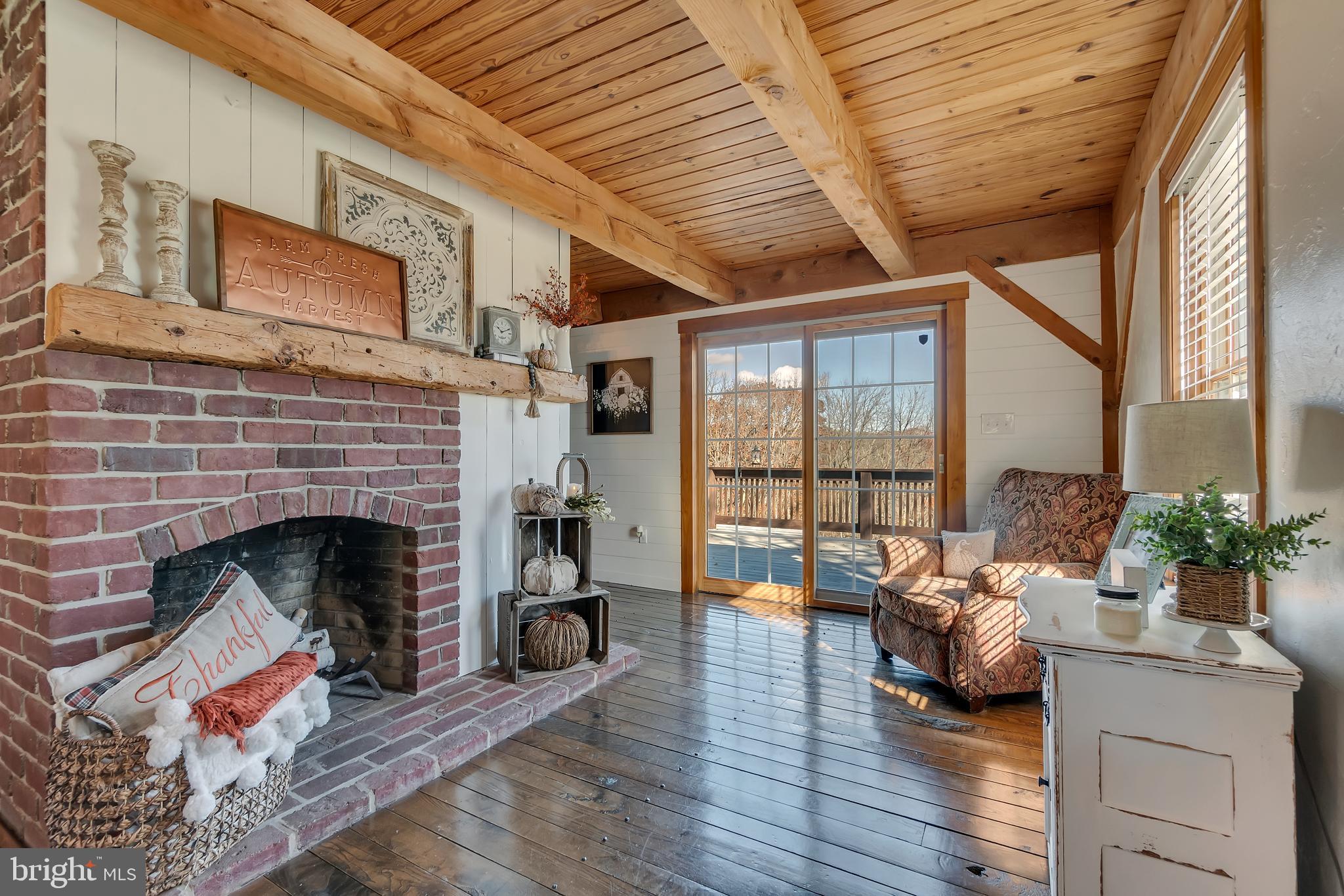 4850 Millers Station Road Hampstead, MD 21074 - Photo 19 of 53 Family Room/Living Room w/FP & SGD to deck