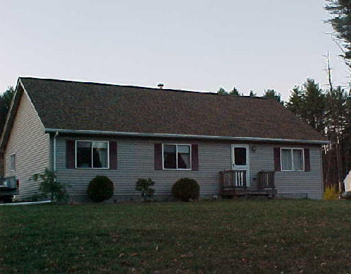 104 Shea Road West Brookfield, MA 01585 - Photo 1 of 1 a backyard of a house with seating space
